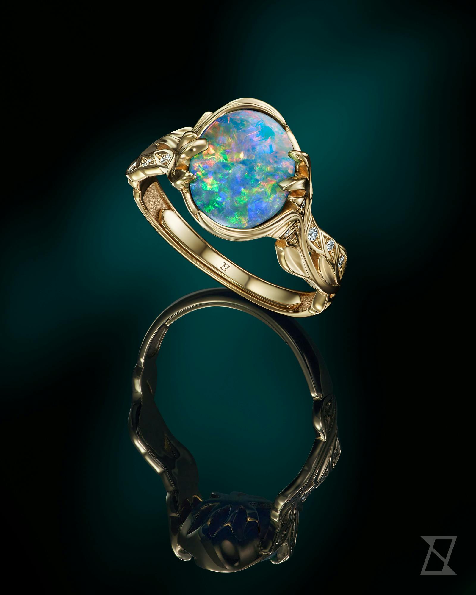 Luxury engagement ring with opal and diamonds