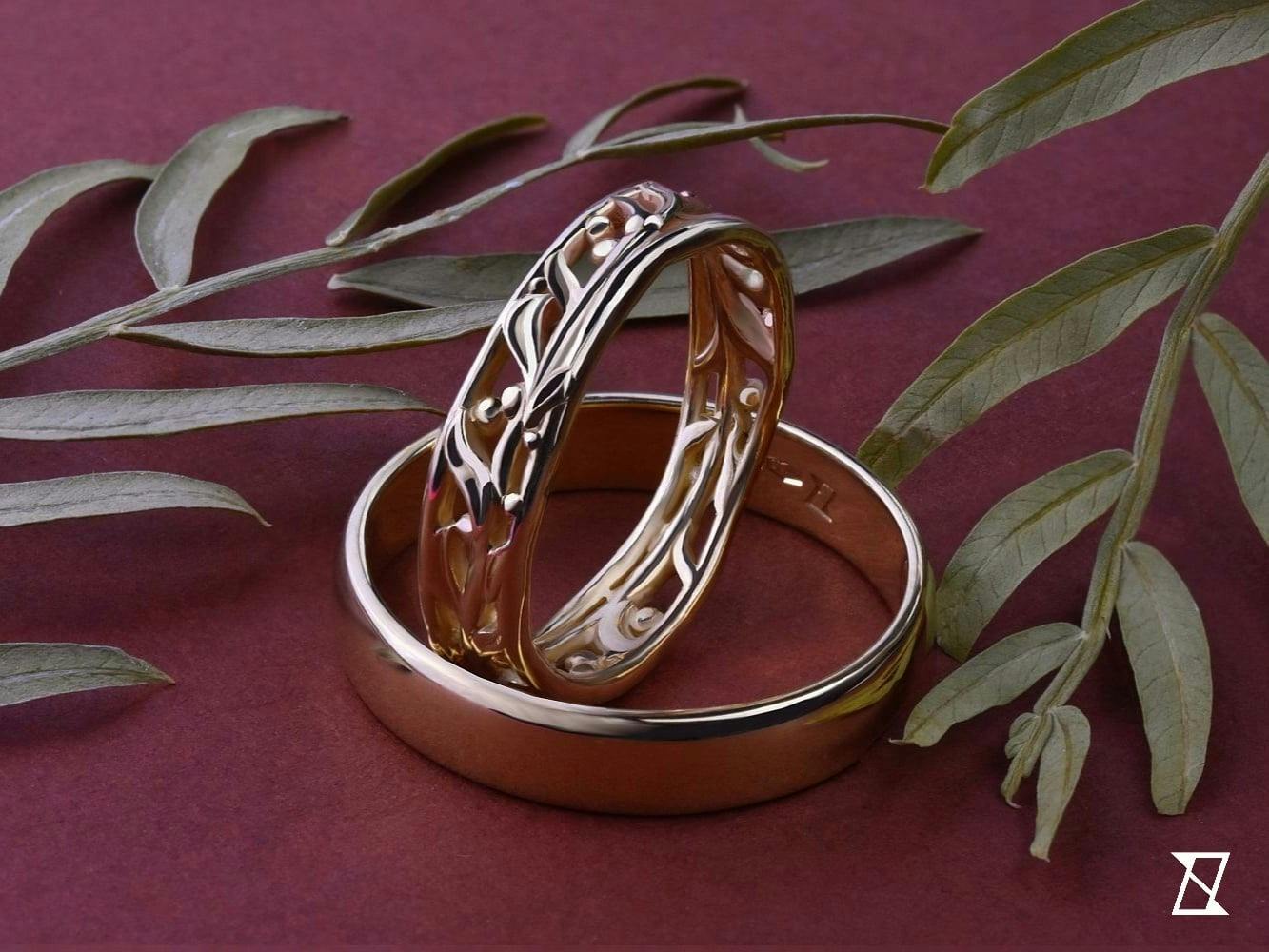 Обручальные кольца с мотивом оливковой ветви.