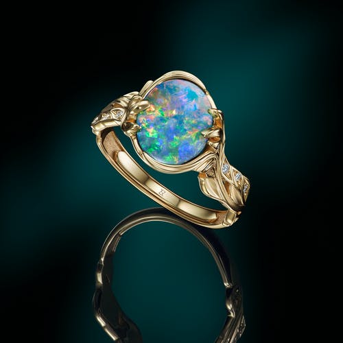 Ring with black opal 
