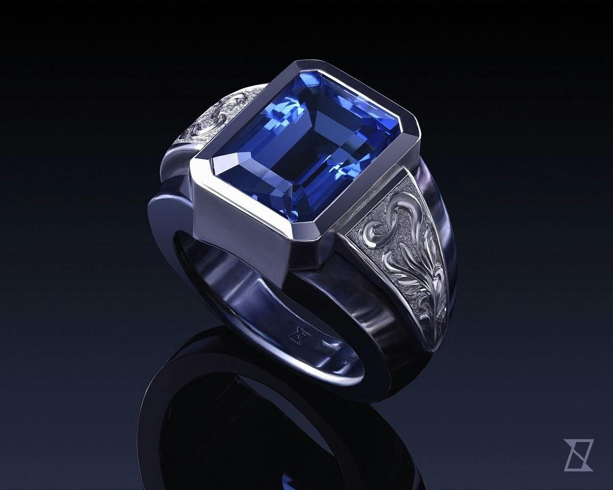 Signet ring with 15 ct. blue topaz in two colour ore.