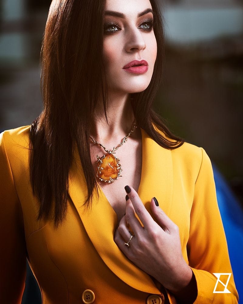 Necklace amber on a model - closeup.