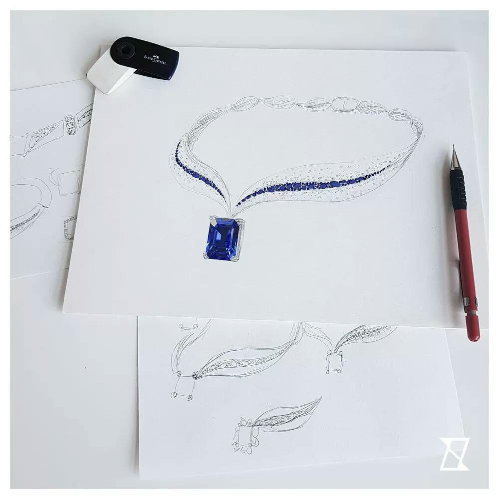 Bespoke design of the tanzanite necklace with diamonds in white gold.