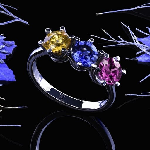 Ring with colored sapphires in white gold.