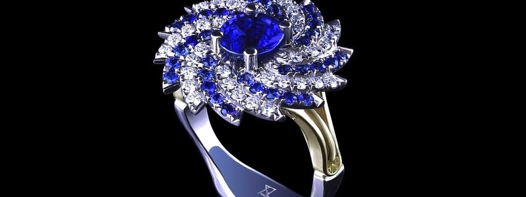 Galaxy ring with sapphire and diamonds.