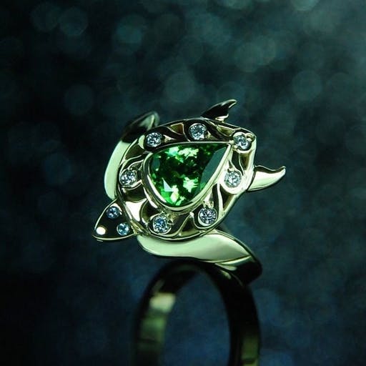 Turtle ring with tsavorite and diamonds in green gold