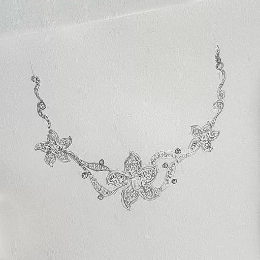 Necklace in the shape of plumeria flowers with diamonds.