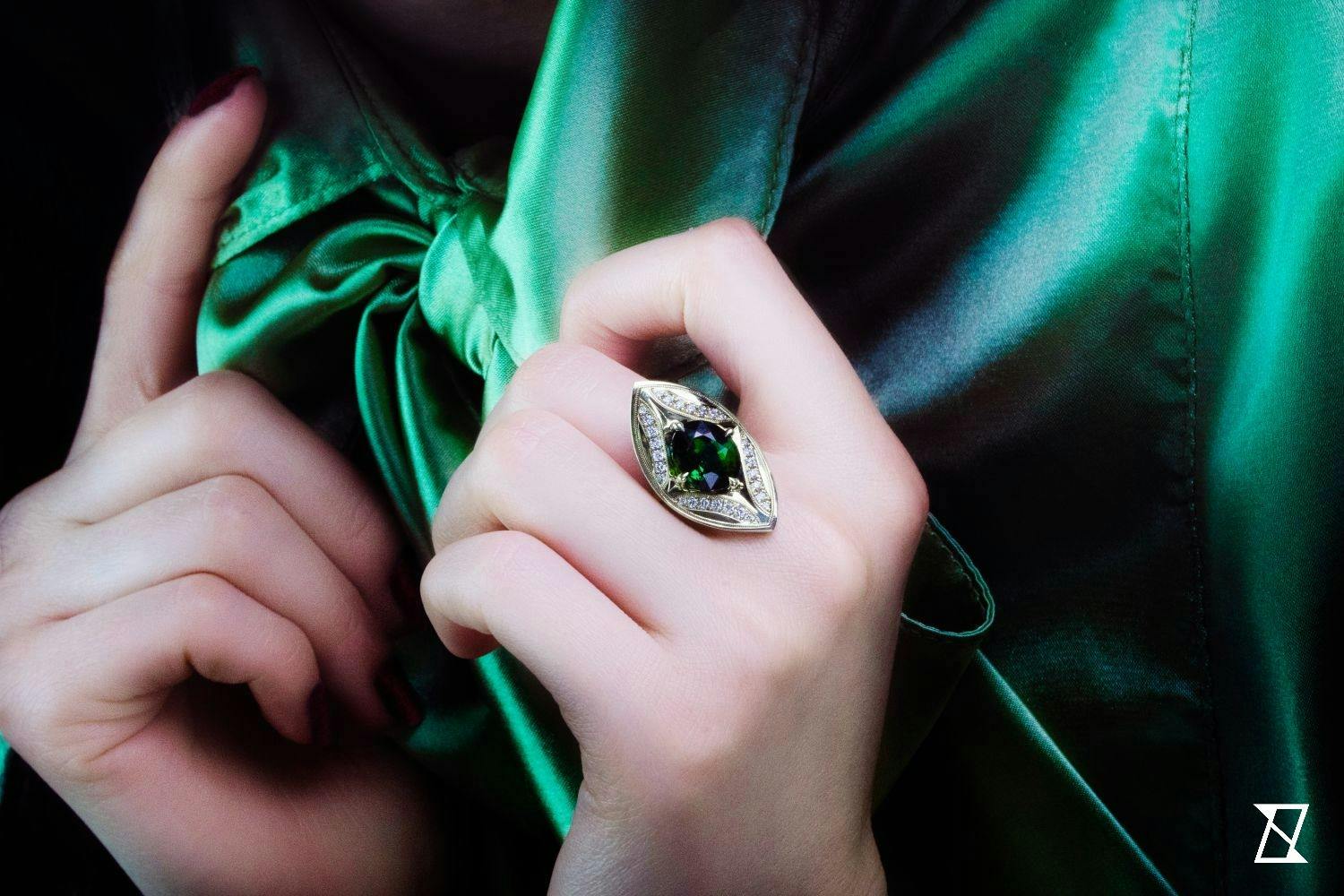 Green tourmaline ring with diamonds. 