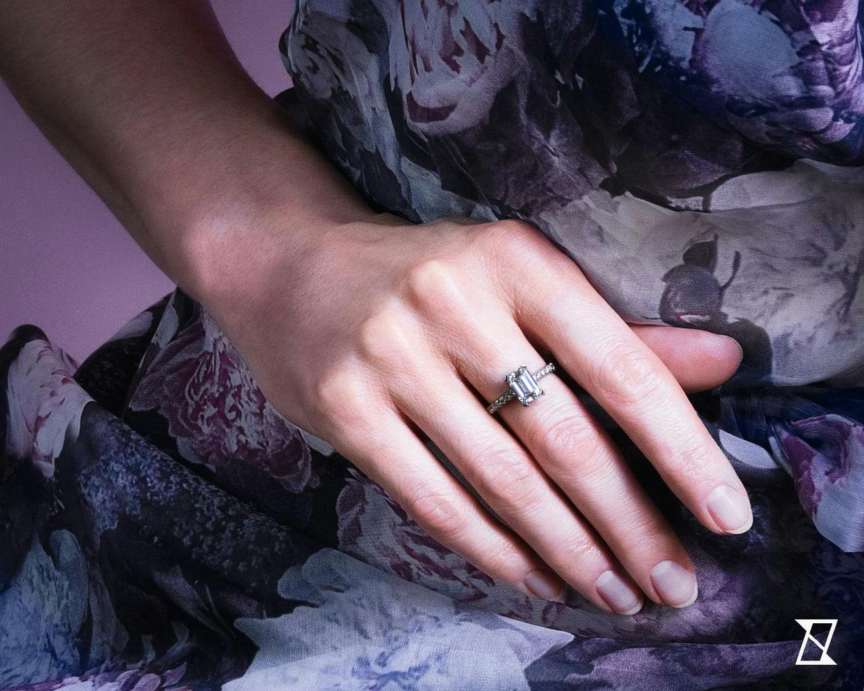 A ring on a hand of a model.