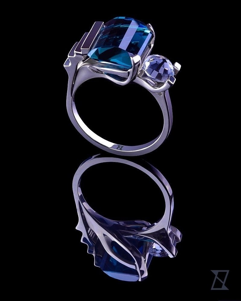 Indigo Tourmaline ring with white sapphire in 18k white gold.