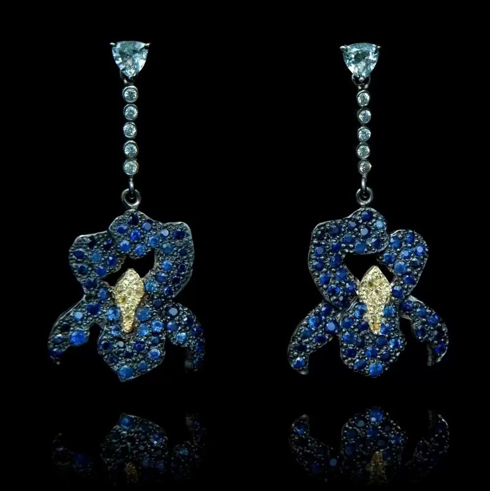 Finished iris earrings with three colours of sapphires. 