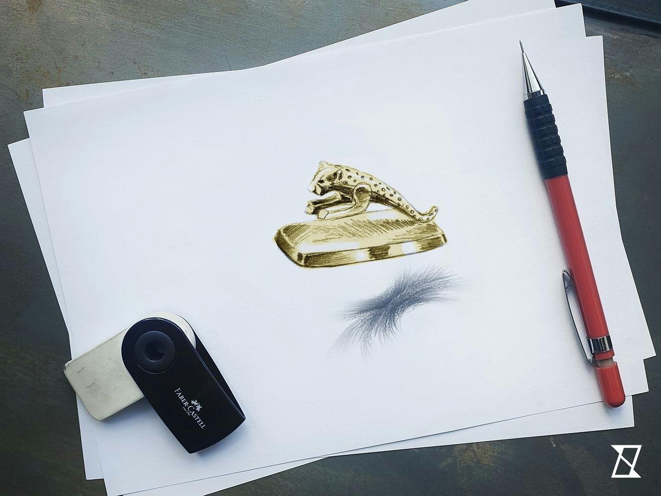 Luksusowy przycisk do papieru ze złota z sylwetką Jaguara