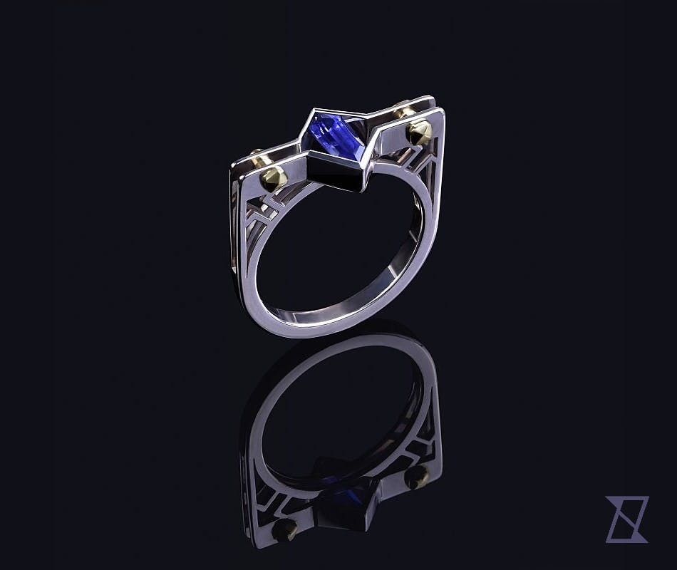 Astronomic ring with custom cut sapphire. 