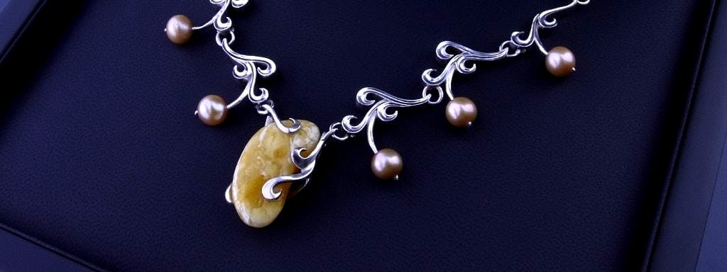 Necklace in the form of foaming waves with baroque Baltic amber and pearls.