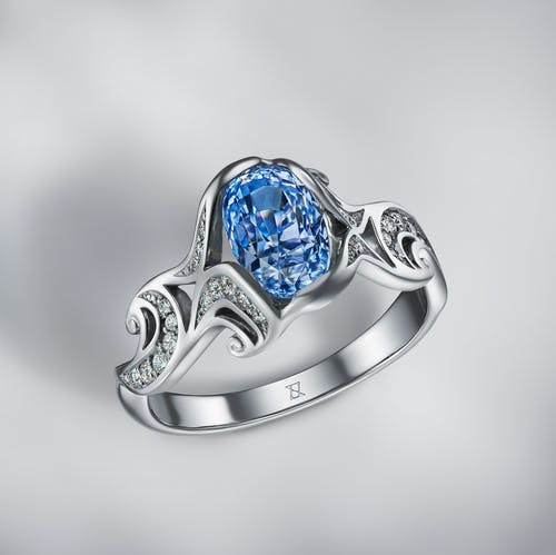 Ring with wave and sapphire