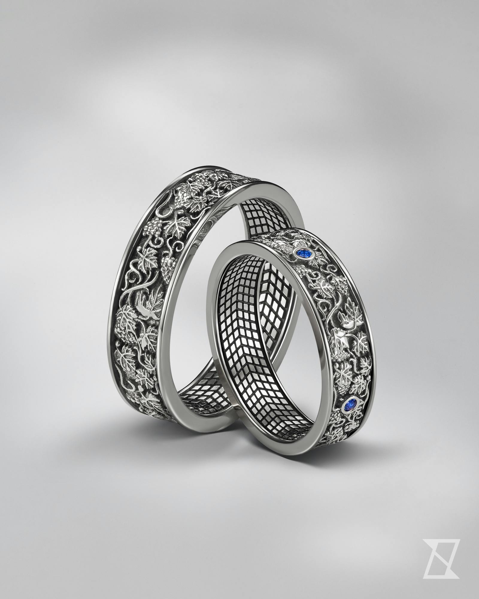 Wedding rings with a vine and travel motif