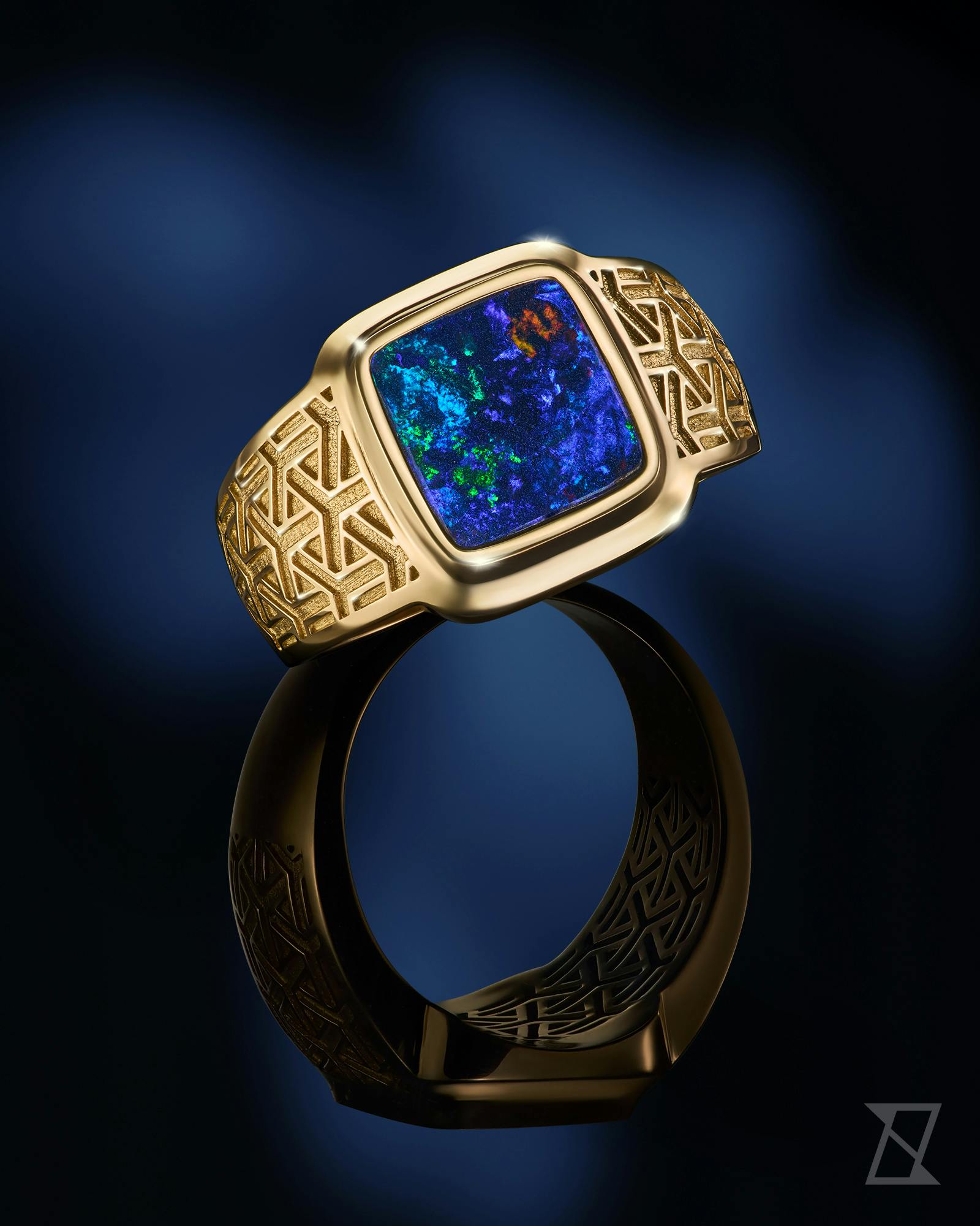 Signet ring with opal sparkling like a galaxy