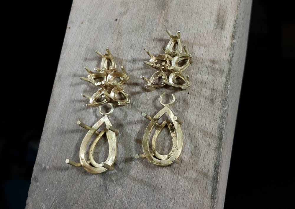 Assmebly of handcrafted earrings.