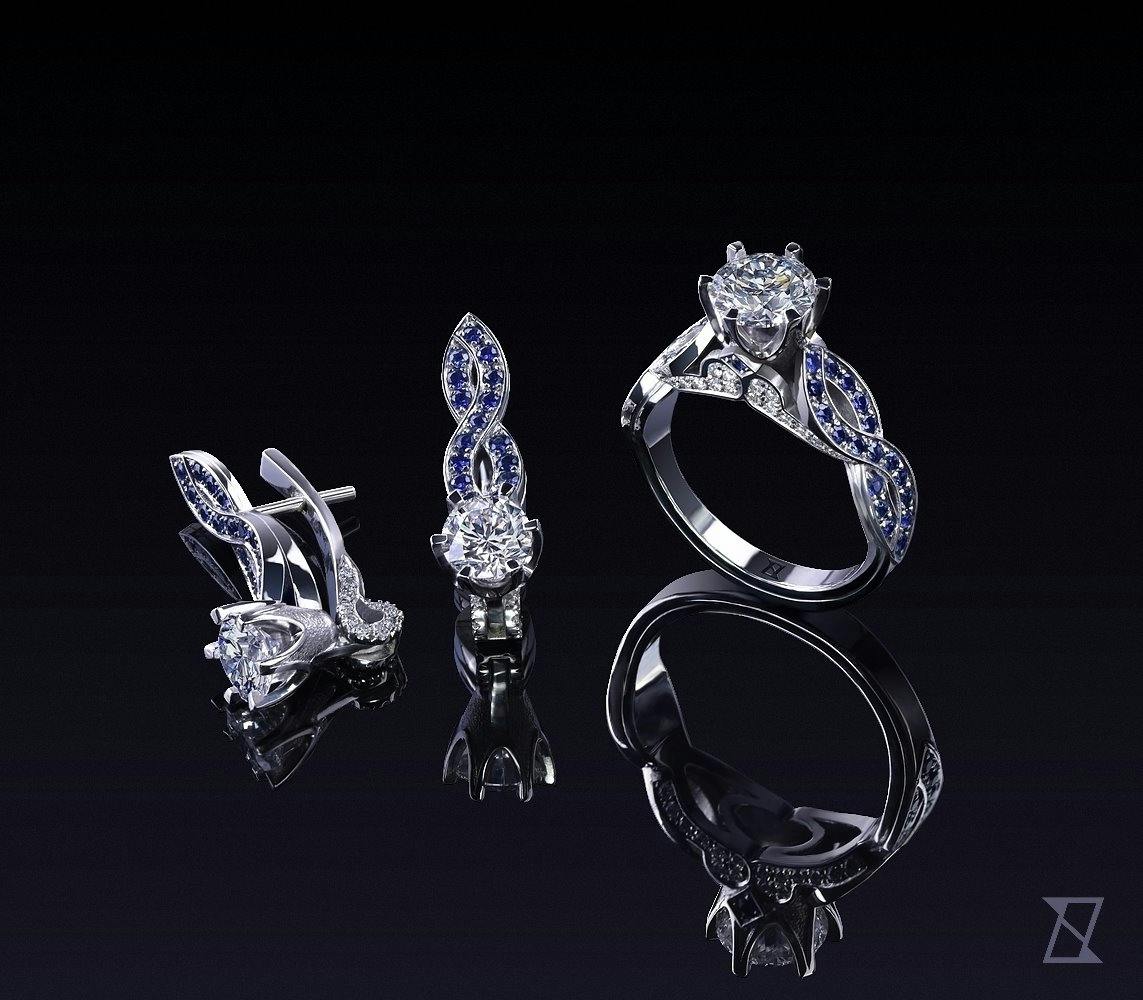 Jewellery set in diamonds and sapphires in platinum. 