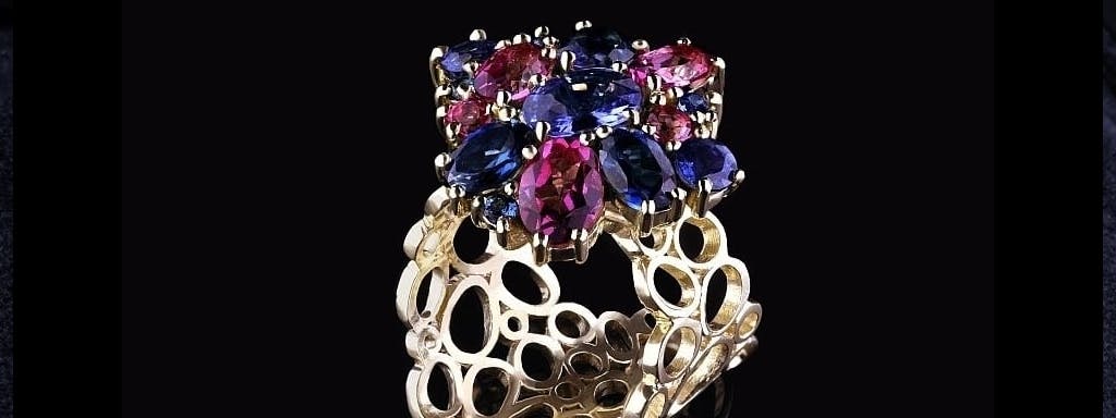 Ring with gold sapphires and topazes
