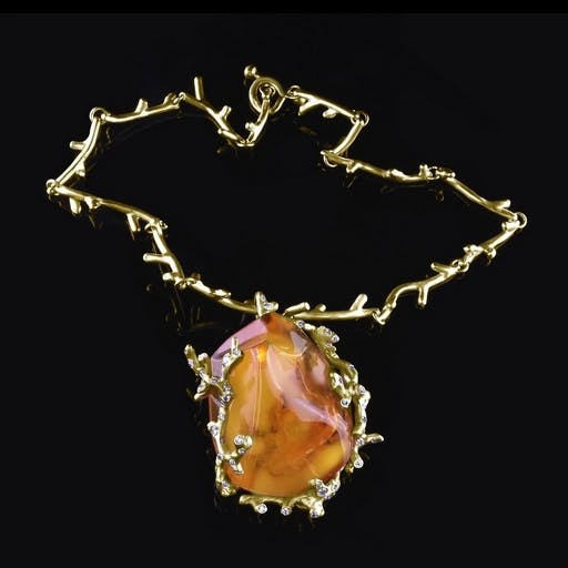 Baltic amber necklace with gold coral and diamonds. 
