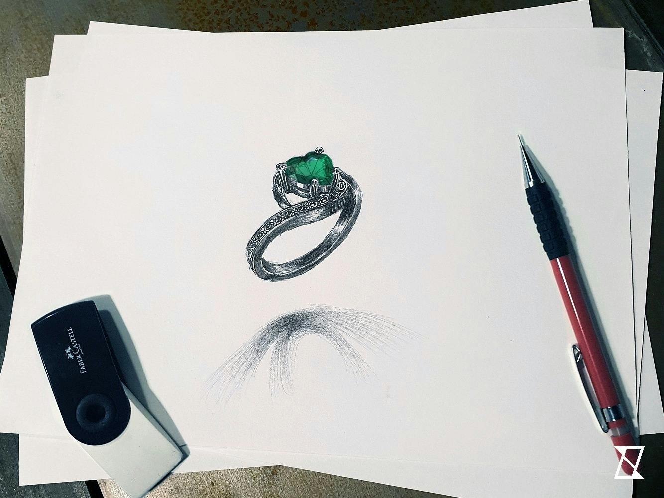 Bespoke sketch of an engagement ring with emerald heart.