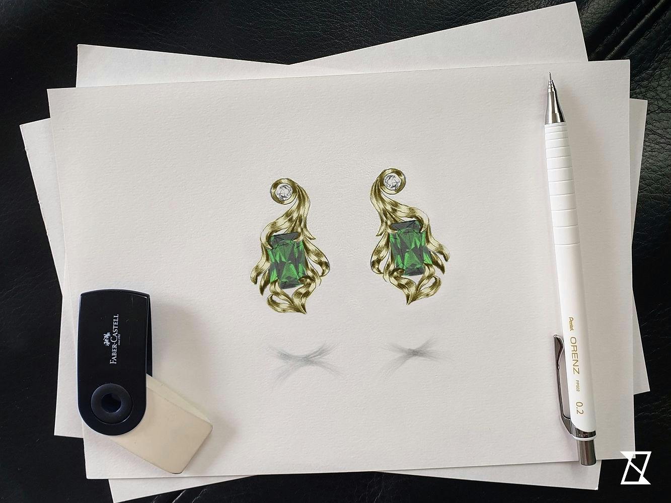 Bespoke design of unique floral earrings with emeralds.