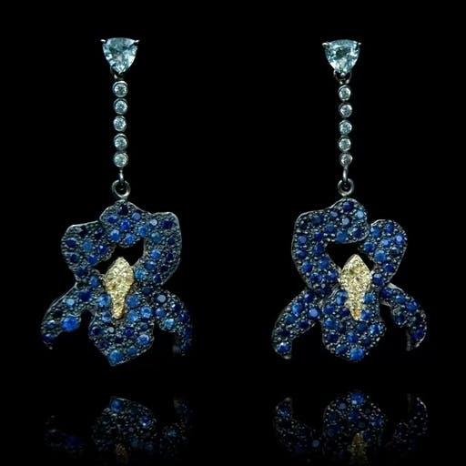 Earrings with irises featuring three colour sapphires.