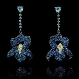 Earrings with irises featuring three colour sapphires.