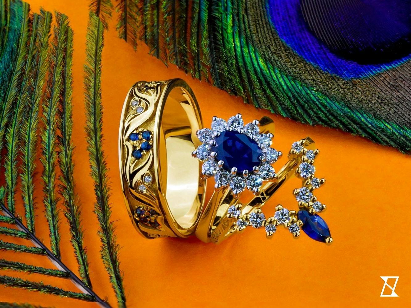 Perfectly matched wedding ring set featuring sapphires and diamonds. 