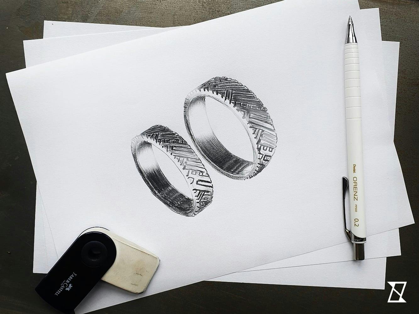 Bespoke wedding rings set in platinum with deep engraving.