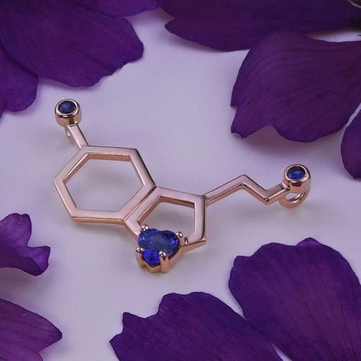 Serotonin molecule necklace with sapphires in rose gold