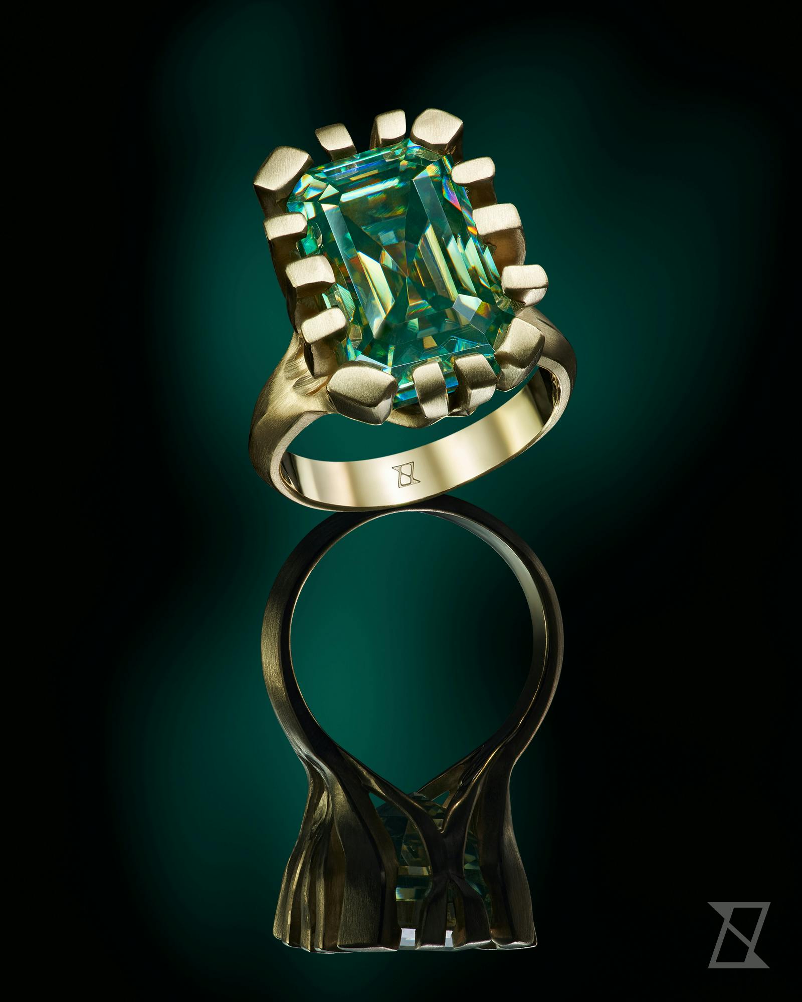 Bespoke modern ring with green moissanite