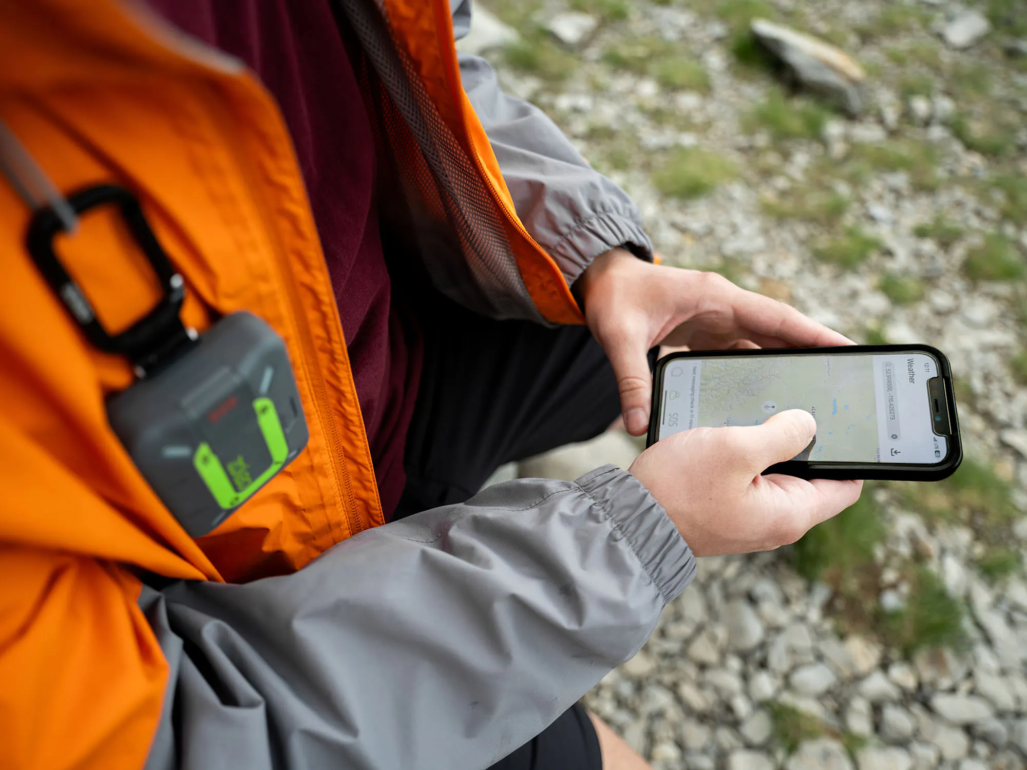 a hiker using ZOLEO app