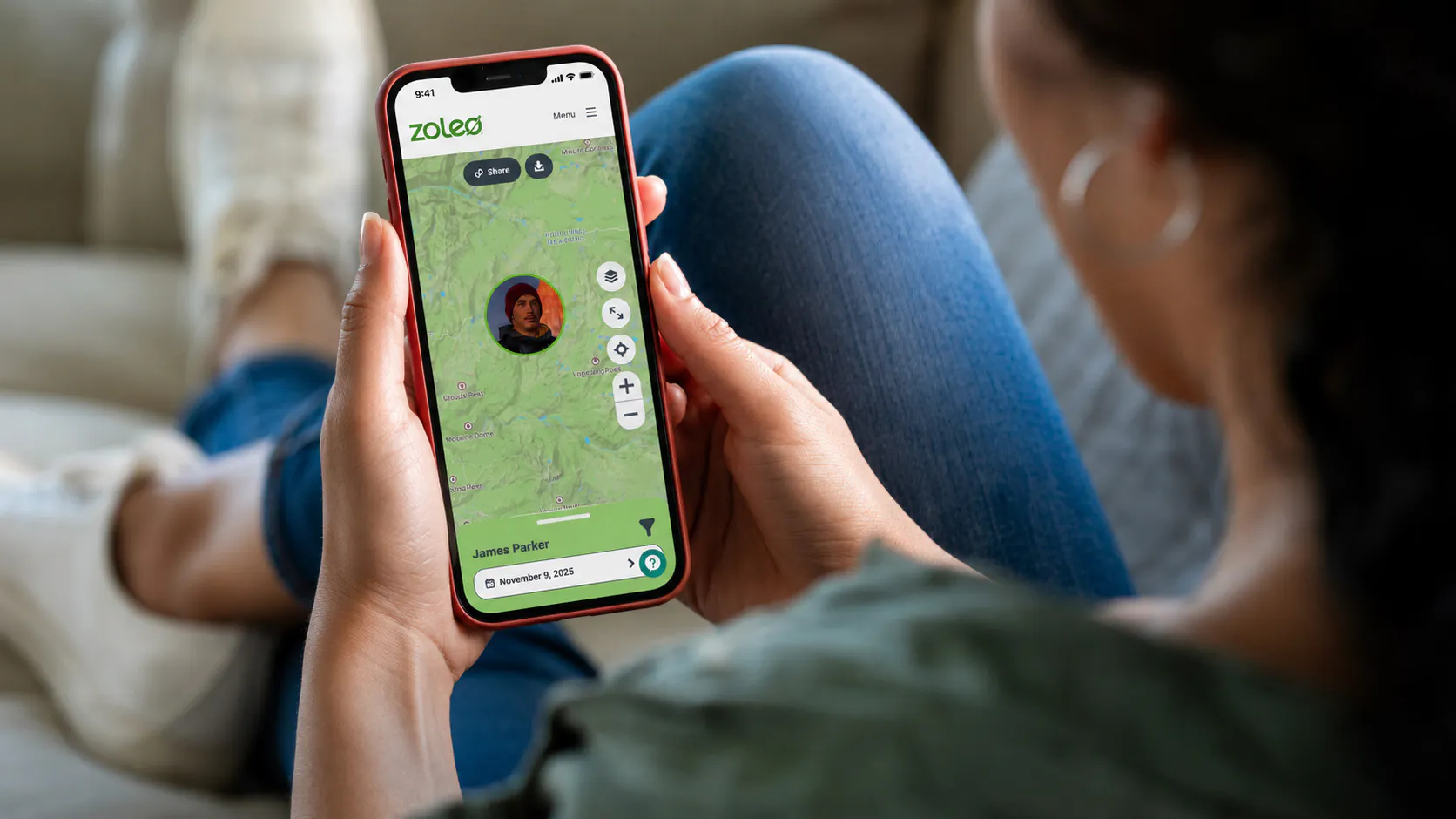 Woman at home looking at partners location through app