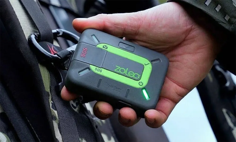 man hunter using a ZOLEO 1000 satellite communicator device