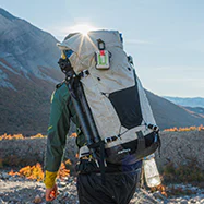Hiker with backpack and ZOLEO