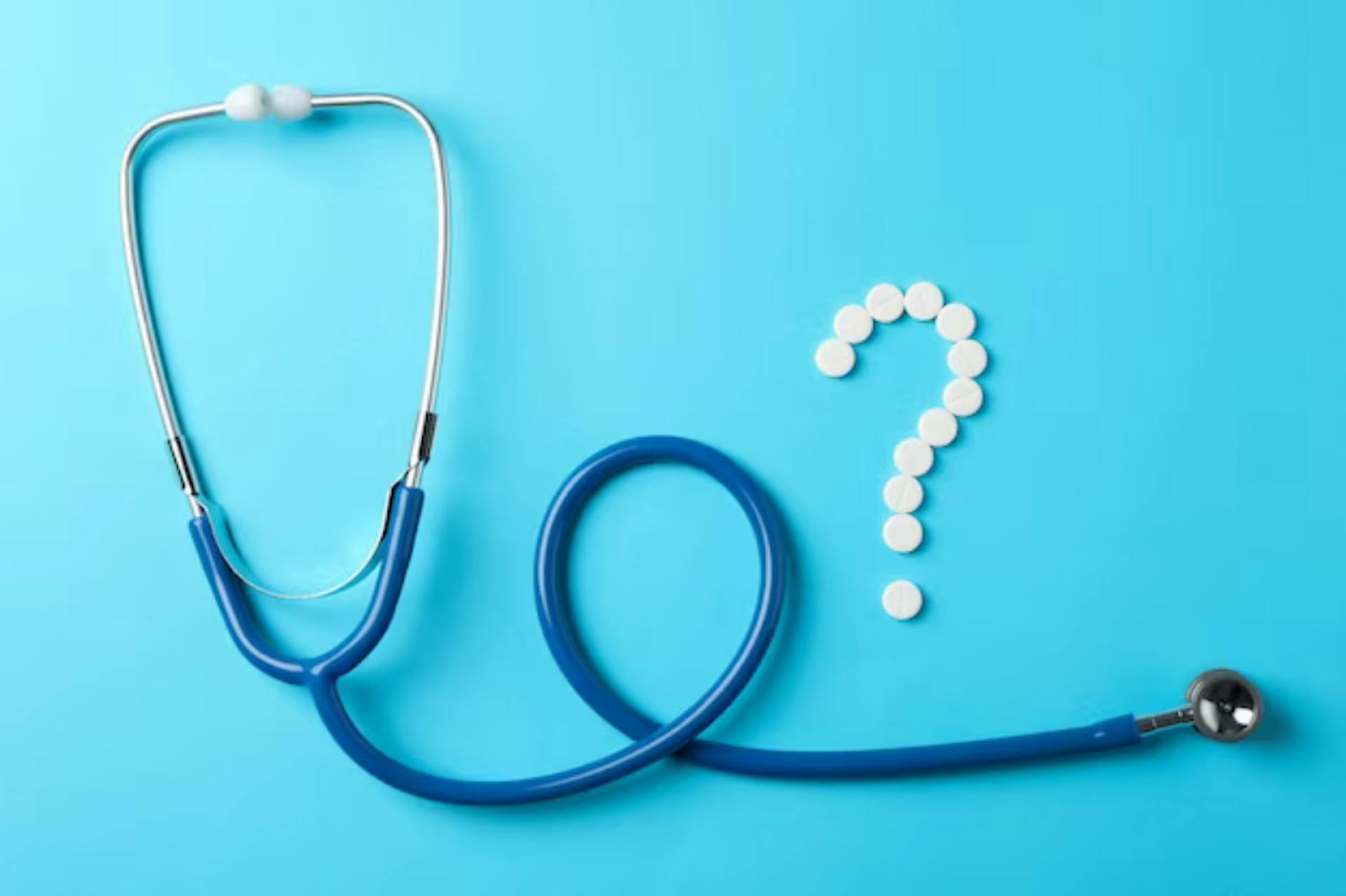  pills-stethoscope-blue-background Image