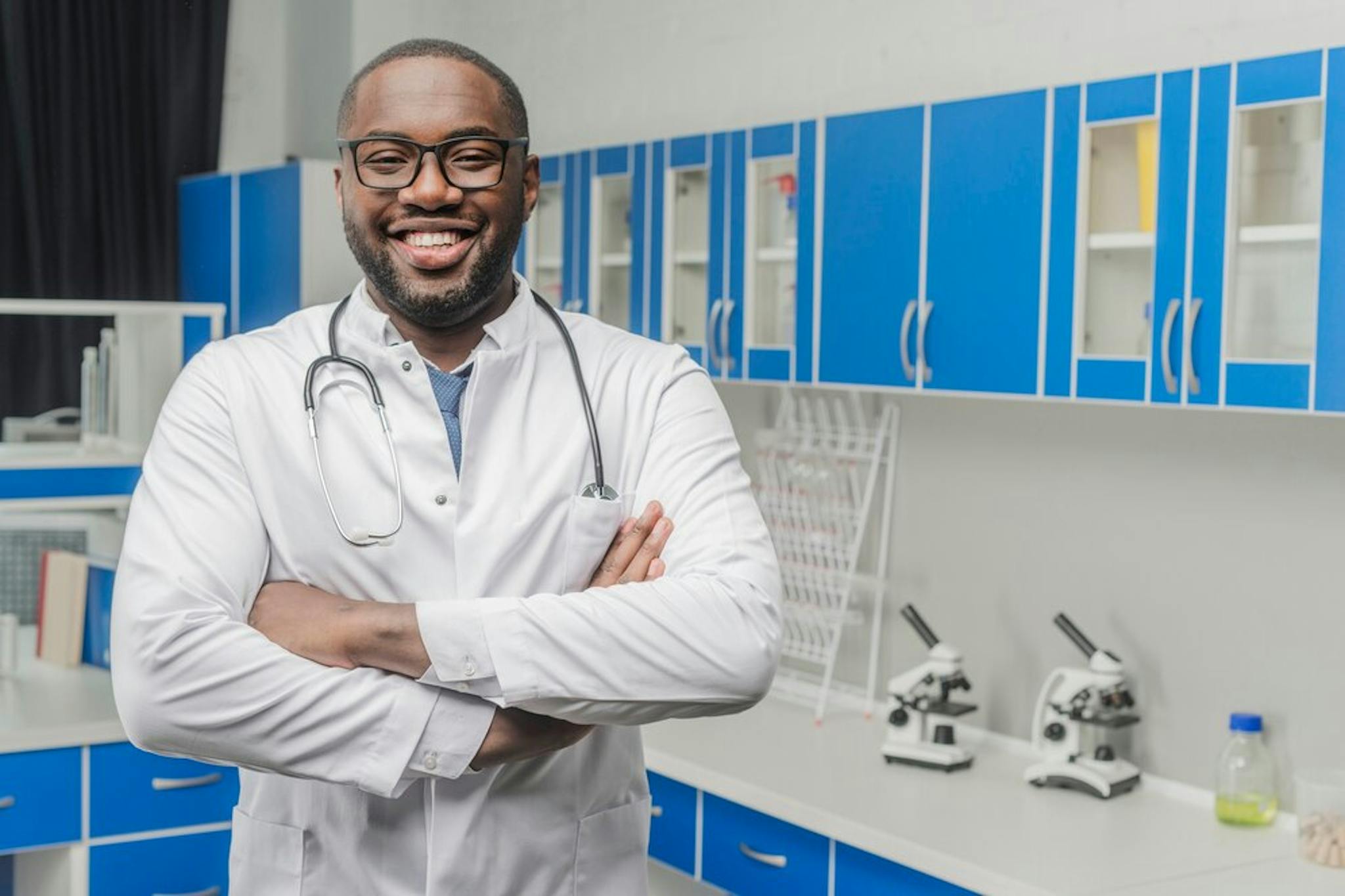 male-doctor-smiling-with-arms-crossed