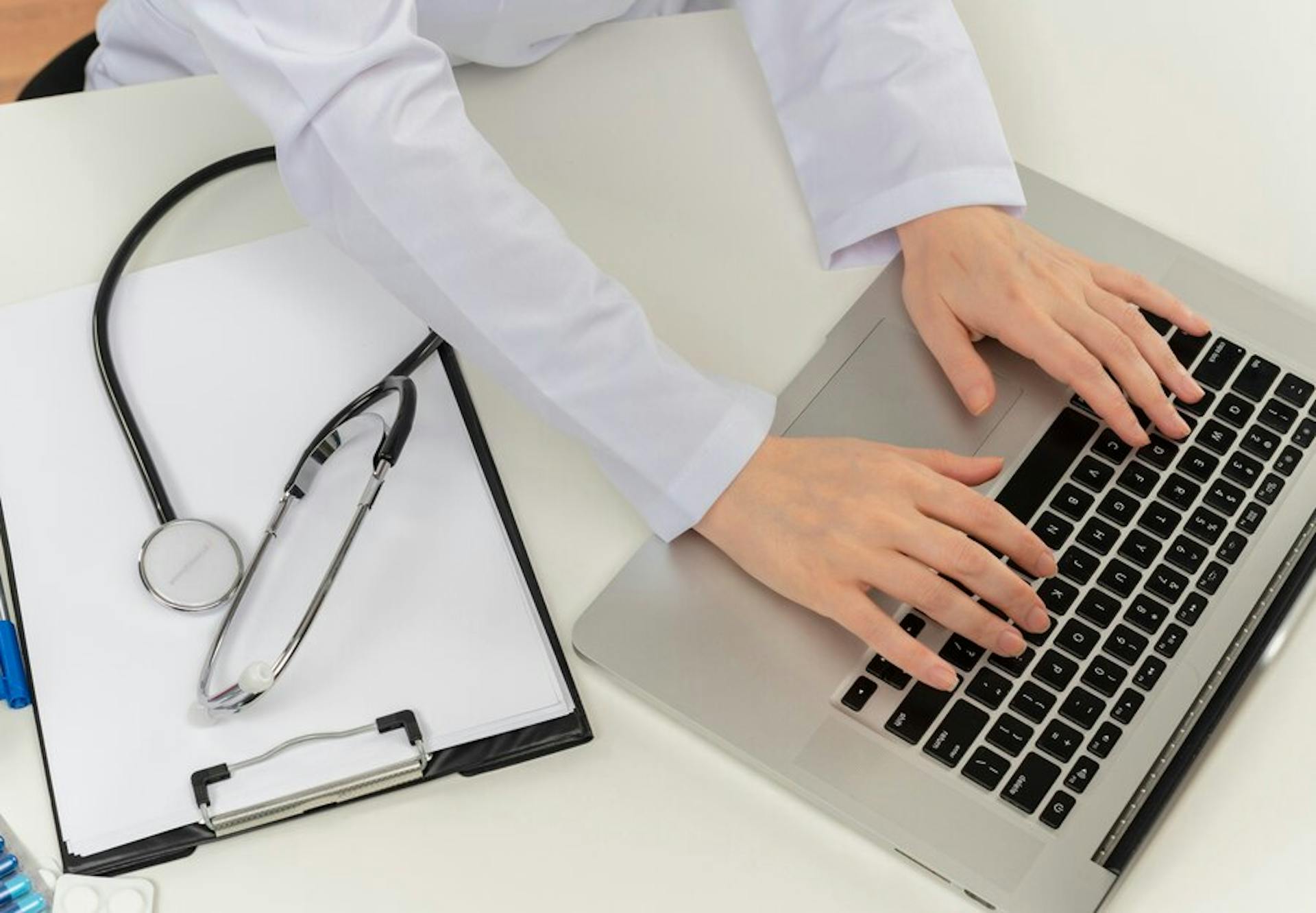 female-doctor-working-with-laptop