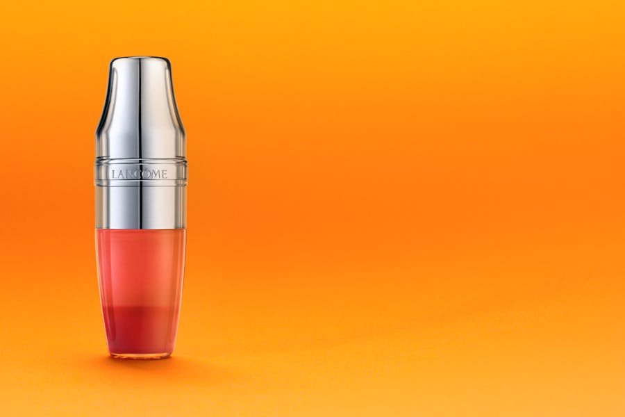 Packshot Lancôme Juicy Shaker on orange background