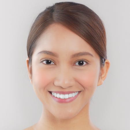 Woman smiles with white teeth