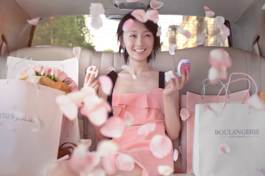 Chinese celebrity Zhou Dongyu in a car in Paris