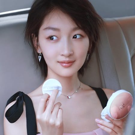 Chinese celebrity Zhou Dongyu with Lancôme cushion