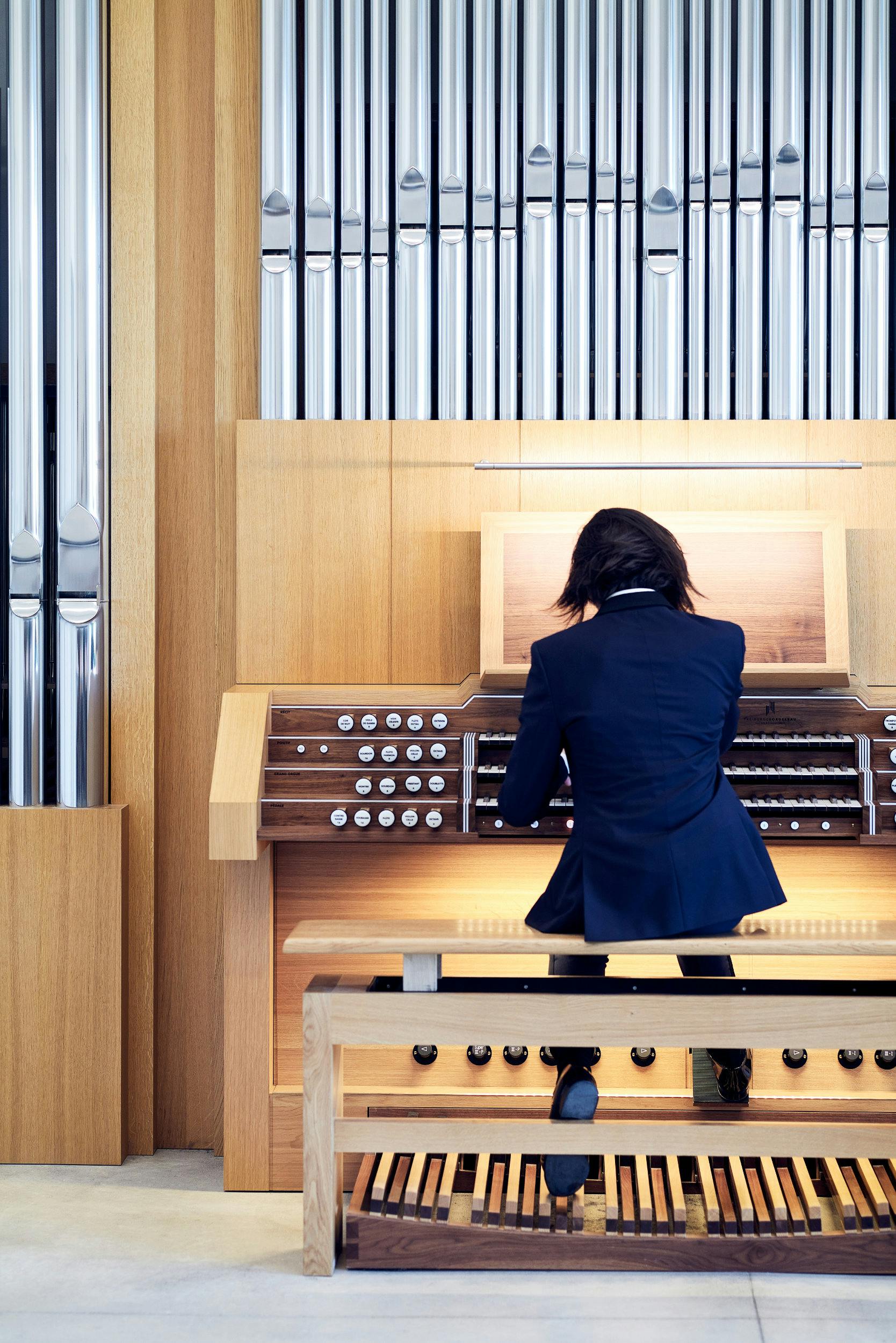 Kid playing the organ